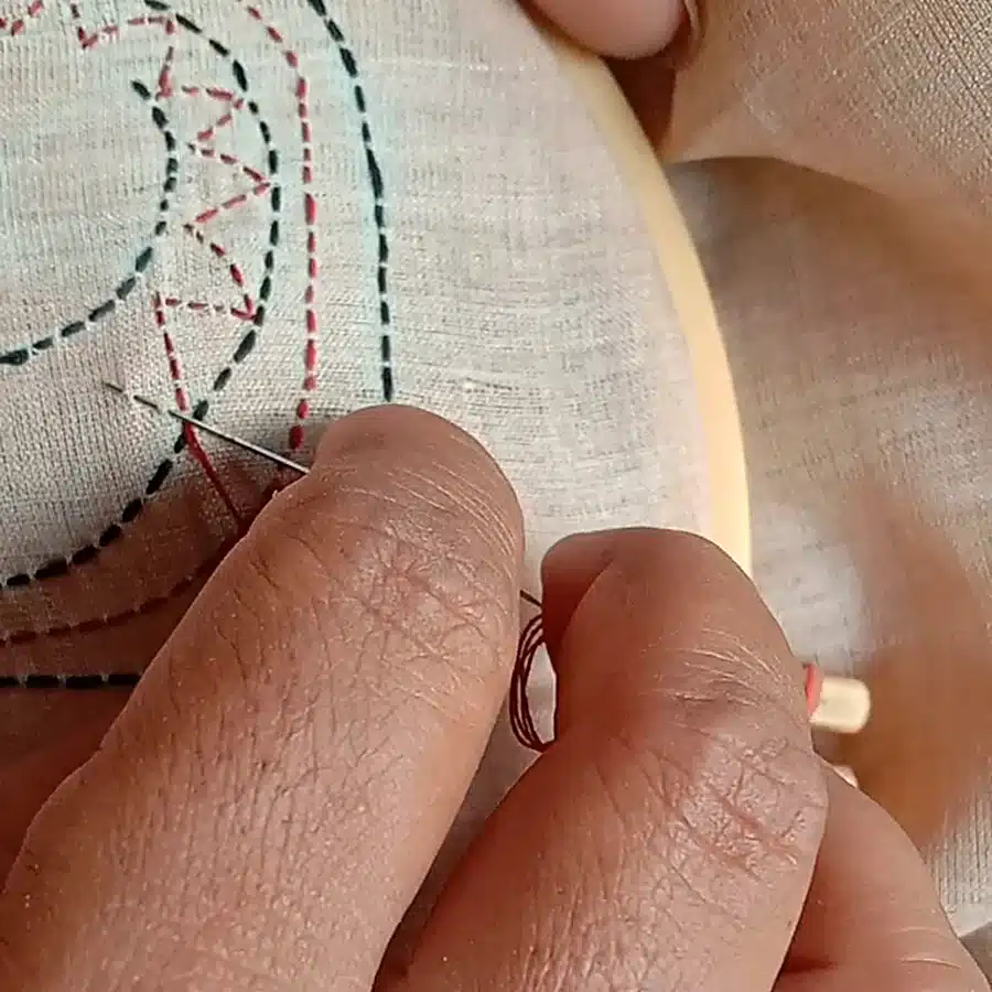 Hand stitching Kantha on tussar